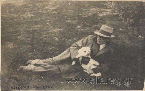 Portrait of a man with a dog in a park