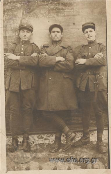 Portrait of two soldiers and a corporal of the Ground Forces.