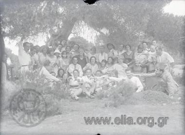 Camp of the walking Association. A group portrait of the campers. Georgios Vafiadakis sits in the first line on the left.