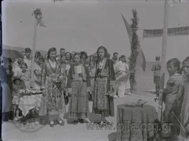 Reception of the excursionists of the Hiking Club, by young women dressed in local costumes.