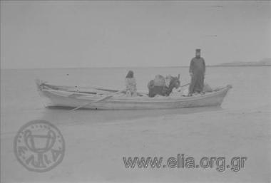 Το πέραμα - βάρκα με ιερέα, γυναίκα και γάιδαρο.