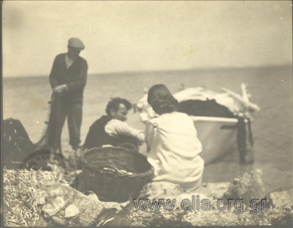 Eva Sikelianou and fishermen.