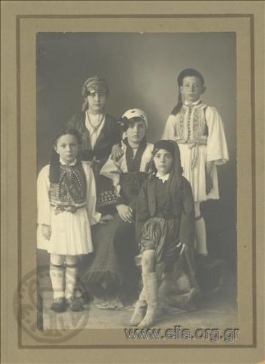Glafkos Sikelianos as tsolias (Greek soldier wearing a kilt) in a group portrait