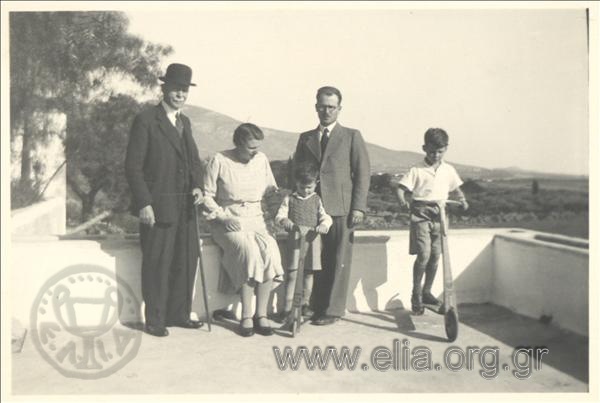Family portrait, Ioannis M. Geroulanos with Despoina, Marinos, Giorgos, and Giorgos Streit.