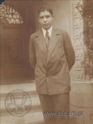 Stefanos G. Streit at the entrance of a house.