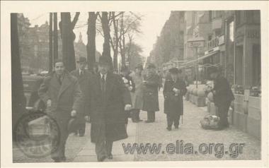 Stefanos G. Streit and man in the street of a European city.