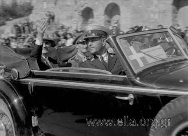Liberation of the country, celebrations, speeches, parades, the hoisting of the Greek  flag on top of the Acropolis by G. Papandreou's 1st government. 