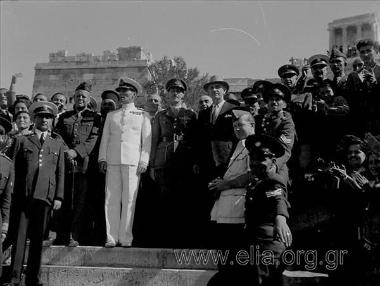 Liberation of the country, celebrations, speeches, parades, the hoisting of the Greek  flag on top of the Acropolis by G. Papandreou's 1st government. 