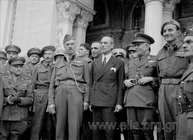 Liberation of the country, celebrations, speeches, parades, the hoisting of the Greek  flag on top of the Acropolis by G. Papandreou's 1st government. 