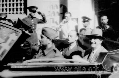 Liberation of the country, celebrations, speeches, parades, the hoisting of the Greek  flag on top of the Acropolis by G. Papandreou's 1st government. 