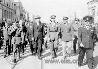 Liberation of the country, celebrations, speeches, parades, the hoisting of the Greek  flag on top of the Acropolis by G. Papandreou's 1st government. 