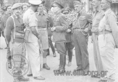 Liberation of the country, celebrations, speeches, parades, the hoisting of the Greek  flag on top of the Acropolis by G. Papandreou's 1st government. 