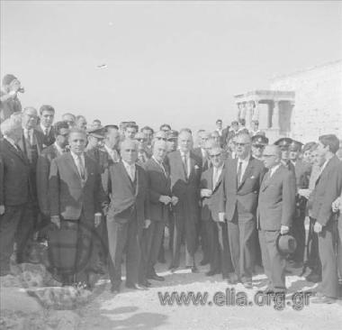 Liberation of the country, celebrations, speeches, parades, the hoisting of the Greek  flag on top of the Acropolis by G. Papandreou's 1st government. 
