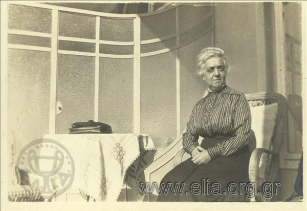 One of Nikolaos Tombazis' aunts seated on a veranda.