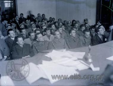 18-30 Μαρτίου. Δίκη των δημοκρατικών αξιωματικών του κινήματος της 1ης Μαρτίου. Στέφανος Σαράφης, Χριστόδουλος Τσιγάντες.