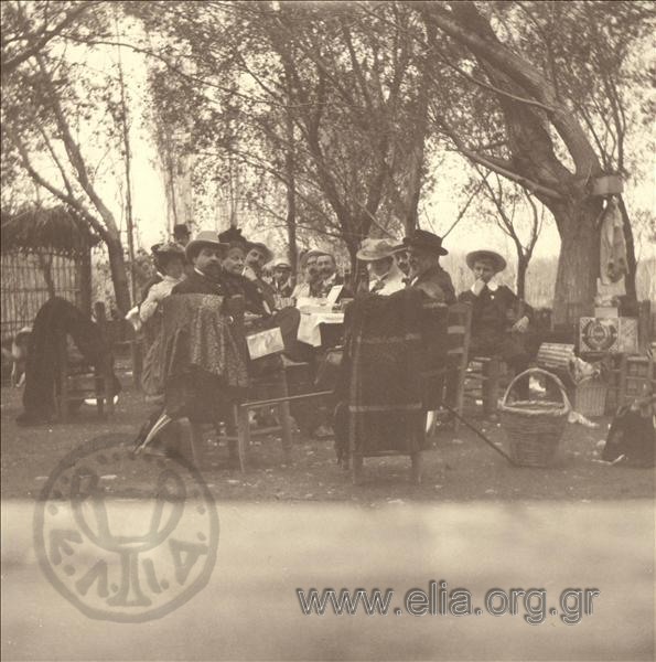 Alexandros Vouros and company having a meal in the countryside, excursion