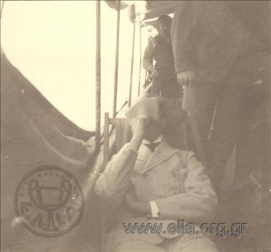 Alexandros Vouros on a deck chair on a boat, an excursion
