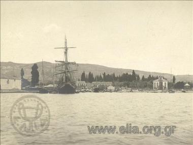Port and a sailing-vessel seen from a ship, excursion