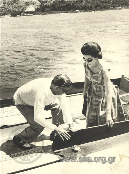 Aristotelis Onassis and Maria Kallas going ashore at Argostoli on a visit to shipowner Vergotis' mansion