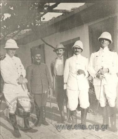 Two British and one French Navy officers with British Cosul Gregory Lewis Mark and the Turkish commander holding a meeting to discuss the terms of the truce during the Italian -Turkish War.