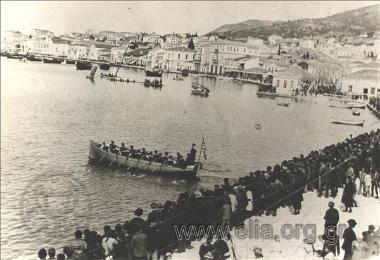 Themistoklis Sofoulis taken to a naval ship on a visit for the official seizure of the island by Greek  forces