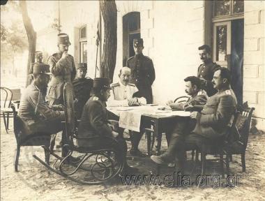 King Konstantinos (in mourning over King Georgios 's assassination) with staff officers Ioannis Metaxas, Victor Dousmanis, Xenofon Stratigos and Princes Alexandros, Nikolaos and Andreas (?). Balkan War II