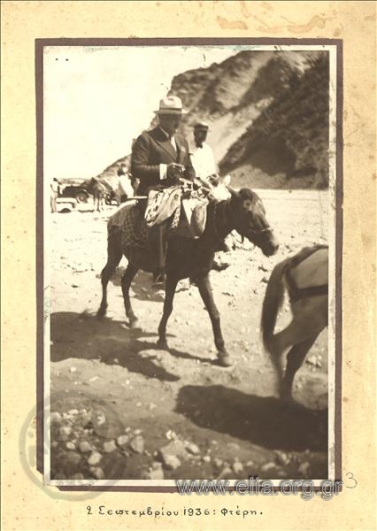 Konstantinos Kotzias on a donkey ride