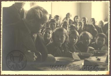K. Kotzias at free meals provided by the municipality in Naousa on his Journey to Thessaloniki - Beroea - Naousa