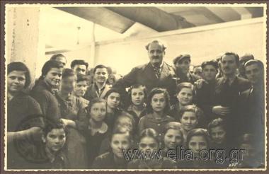 K. Kotzias with women workers at the spinning factory in Naousa on his Journey to Thessaloniki - Beroea - Naousa