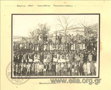 Schoolchildren, men in traditional cortume, musicians and others in Megalopoli.