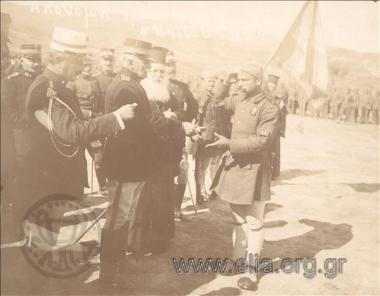 Snapshot from the prize-awarding ceremony to shooters: evzone receiving a medal from a superior officer of the Ground Forces. First on the left, the Major of Artillery, Leonidas Paraskevopoulos.