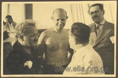 K. Kotzias in company on a yacht