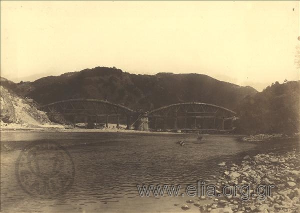 The construction of a bridge at Nestos river. View of the bridge with the two stringers from the river watercourse.