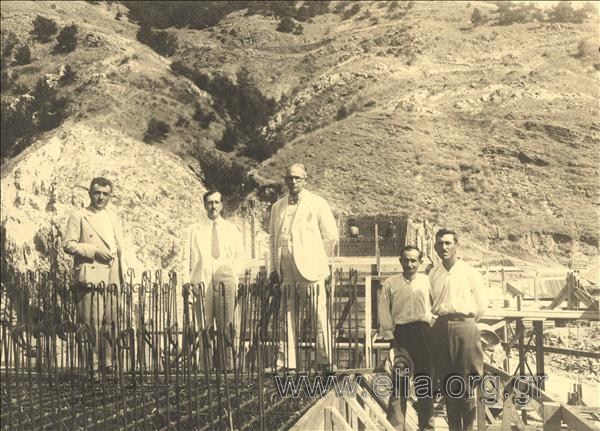 The construction of the bridge at Nestos river. The contractor (?) pose on the bridge.