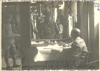 Pasta-making workshop of the Greek  Army housed at a former Armenian cinema. Lieutenant Nikolaos Tsertos, director of the General Centre at Dorylaiou, discusses with lieutenant Georgopoulos, responsible for the financial and technical study