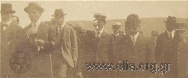 Prime Minister  Eleftherios Venizelos with Minister for Social Relief Spyridon Simos and politicians (?) at the inauguration of a refugee settlemen