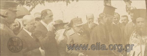 Members of the Council of Ministers (Κl. Markantonis, Spyridon Simos), servicemen (Leonidas Paraskevopoulos, Panagiotis Danglis) and priests in the opening of a refugee settlement.