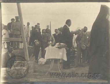 Minister for Social Relief Simos delivering a speech at the foundation stone laying ceremony of the 