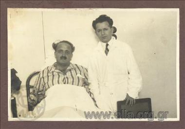 Mayor of Athens Kostas Kotzias as a patient and doctor in a ward of Evangelismos Hospital on New Year's Day