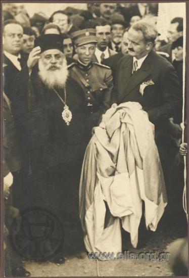 Kyrinia Bishop handing over the flag of Cyprus to be flown from the pole on the Akropolis. Mayor of Athens Kostas Kotzias is attending