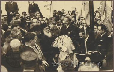 Kyrinia Bishop handing over the flag of Cyprus to be flown from the pole on the Akropolis. Mayor of Athens Kostas Kotzias is attending