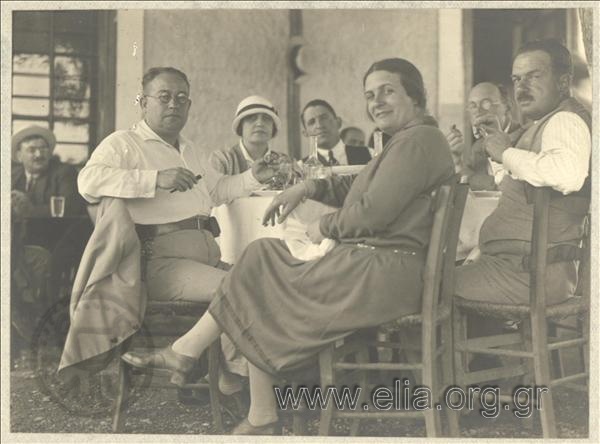 Iris, Vafiadakis and their company at a restourant in Diakofto.