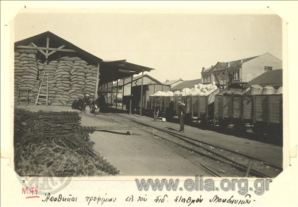 Asia Minor campaign, food storage at the Moudania railroad station. Sailors rest next to the sheds.