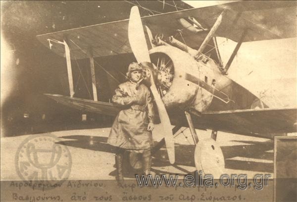 Flight sub-lieutenant Mimis Vasilounis by a plane, Aidini airbase