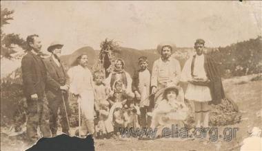Excursionists  in a settlement of an Albanian family