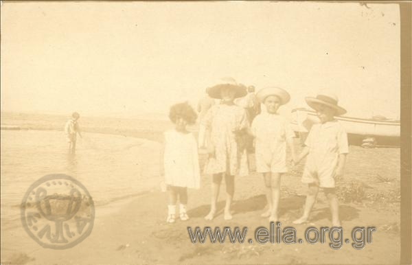 Company of children on the beach