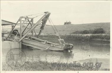 Drainage work at Lake Ioannina, reshaping of the peripheral canal around the lake: the fore section of dredger 