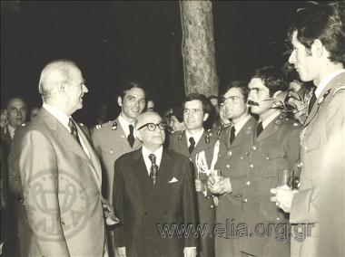 July 31, President Konstantinos Tsatsos and Prime Minister Konstantinos Karamanlis with a group of graduates from Army Academies during the reception in their honour at the Presidential Palace.