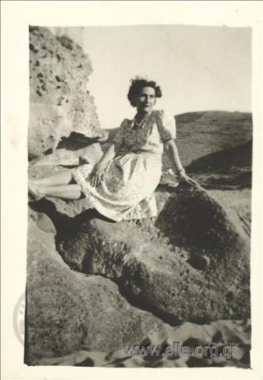 Katina Fotiadou on a rock at the island. From her visit to the military camp to celebrate Easter with her husband Dimitris.