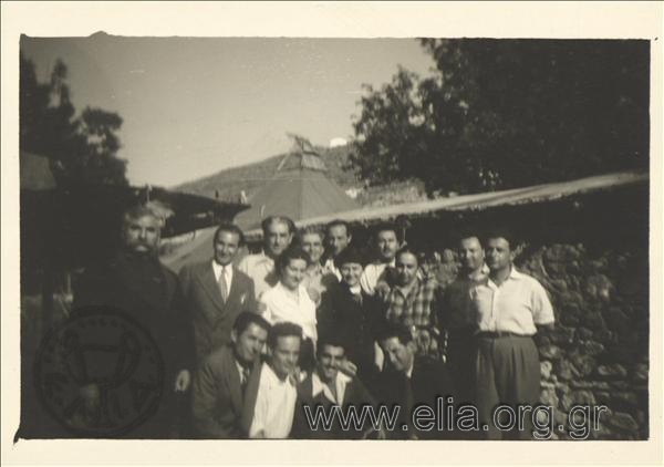 Exiles in front of the house where Giannis Ritsos had lived in exile: Menelaos Loudemis (with the tie), Dimitris Fotiadis, Manos Katrakis, Giannis Ritsos, his sister Kotini and others